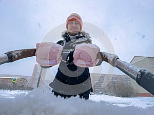 Father walks through the snowy landscape, child moment of seasonal joy.