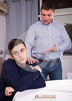 Father is wanting talking with his adult son after conflict