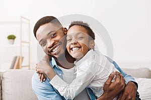 Fatherhood concept. Lovely father and daughter embracing