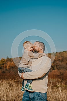 Fathers day, Happy loving family. Father and son playing, having fun on the nature. Happy family, Fathers Day and local summer