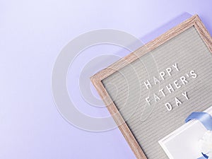 Fathers day purple greeting card with text on letter board