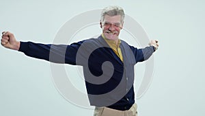 Fatigued senior man stretching oneself. isolated on white background