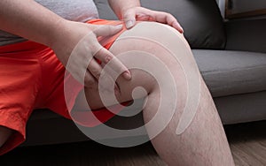 Fatty man suffering from pain in knee, Pain In overweight, Health care, total knee replacement