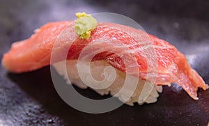 Fatty tuna belly nigiri sushi.