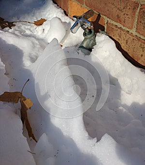 Faucet Buried in Snow, Frozen Pipes