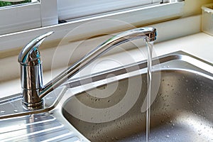 Faucet with a flowing water