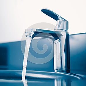 Faucet with flowing water