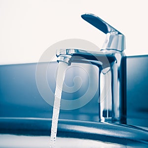 Faucet with flowing water