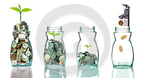 Faucet putting mix coins and seed in clear bottle on white background,Business investment growth concept