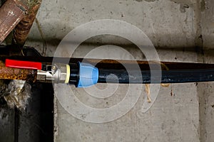 Faucet of water plastic pipe on basement