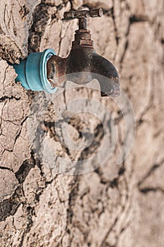 Faucets on dry ground drought and crisis environment