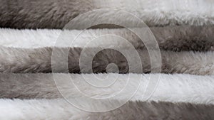 Faux fur texture in the form of waves of gray color. The Concept of Abandoning Natural Fur