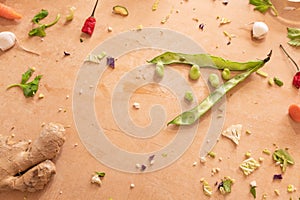 Fava beans on a wooden kitchen table