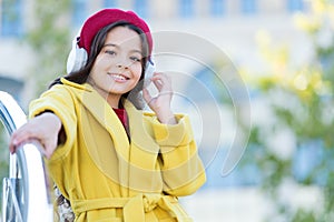 Favorite band. Influence of music. Child girl autumn outfit enjoying music. Teenage music taste. Little girl listening
