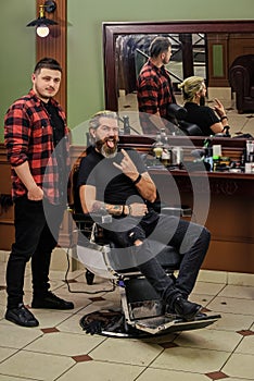 a favorite desire. dye hair and give new shape. male hairdresser salon. barber professional master. making new hairstyle