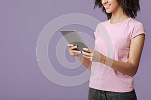 Favorite modern blog and social media. Cheerful woman reading message on digital tablet