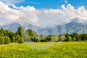 a favorite resting place of Almaty residents in the park of the first president against the backdrop of the Tien Shan mountains.