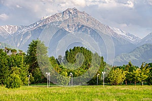 a favorite resting place of Almaty residents in the park of the first president against the backdrop of the Tien Shan mountains.