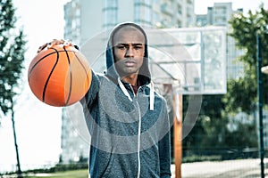 Nice Afro American man having a basketball training photo