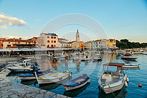 Fazana, Croatia - June 1, 2019: view of boats in dock at sunset.