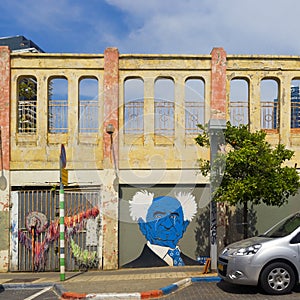 FaÃÂ§ade of the old cinema house with graffiti of Ben Gurion Neve Tzedek Israel