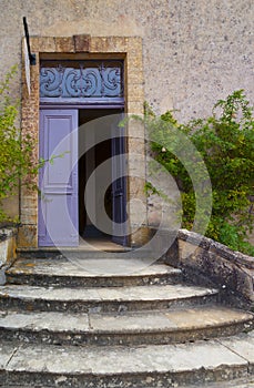 FaÃ§ade with colored door at Le Jardin Marqueyssac France