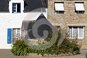 FaÃ§ade parts of Typical constructions in Breton village of Houat island in French Brittany