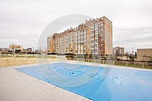 FaÃ§ade of some buildings with a swimming