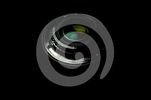 FCamera photo lens over black background