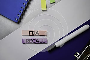 FDA Recall text on sticky notes with color office desk concept photo
