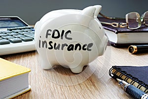 FDIC insurance policy on a desk.