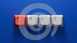 fdic word written on Computer keyboard keys with copy space.close up of Computer keyboard keys