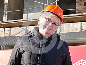 Feamle Engineer in the construction helmet photo