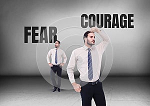 Fear or courage text with Businessman looking in opposite directions