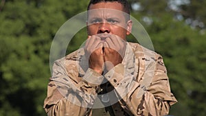 Fearful Hispanic Male Soldier Wearing Camo