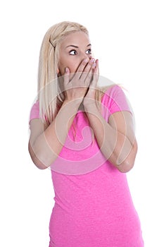 Fearful young woman in pink shirt isolated over white.