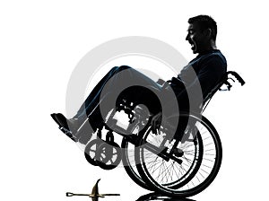 Fearless handicapped man in wheelchair silhouette