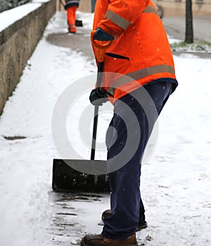 Fearless snow-shovel with the big shovel frees up the sidewalks