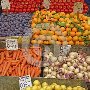 A feast of fruits and vegetables for sale photo
