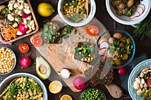 Feast with various salads and sandwiches