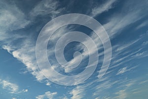 Feather clouds in the blue sky during the day