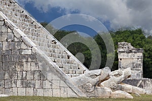 Feathered serpent at pyramid Kukulkan in Chichen Itza photo