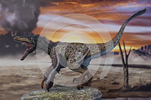 Feathered velociraptor with open mouth in jurassic land with volcano in the background