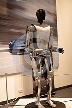 featuring Tesla Bot Optimus, humanoid robot prototype by Tesla, Inc., Artificial Intelligence, highlighting integration of AI and