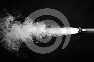 Featuring a white smoke coming out of flashlight on black background. dark and mysterious atmosphere. the light beam from the