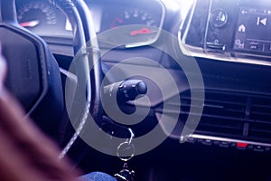 Feb 13, 2022, Rabat, Morocco: Man driver pushing a start ignition button in the Peugot car