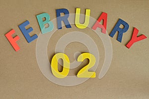 February 02, Toy alphabet background.