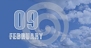 february 09. 09-th day of the month, calendar date.White numbers against a blue sky with clouds. Copy space, winter