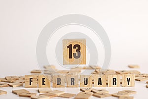 February 13  displayed wooden letter blocks on white background