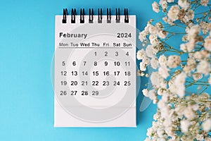 February 2024 Calendar flat lay blue background